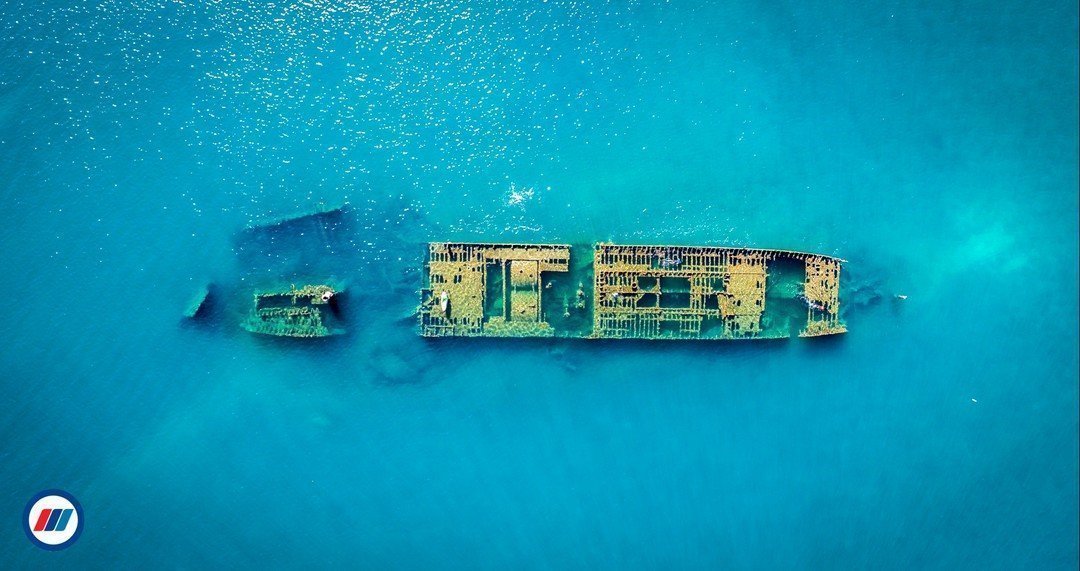 composición fotografía aérea barco