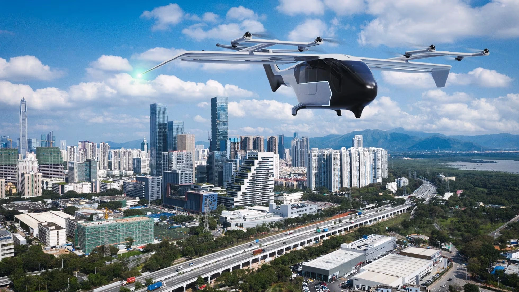 una imagen de una ciudad de fondo y un dron autónomo sobrevolando